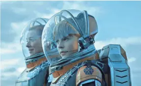  ?? NETFLIX ?? Will Robinson (Maxwell Jenkins, right), and his mother, Maureen (Molly Parker) are in a better place in Season 2 of Netflix’s “Lost in Space.”