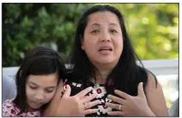  ?? (File Photo/AP/Gerald Herbert) ?? Juliet Daly, 12, sits with her mother Jennifer Daly, on April 30, 2020, as she recounts the ordeal of almost losing Juliet, on the front porch of their family home in Covington, La. In addition to being diagnosed with acute fulminant myocarditi­s, Juliet also was covid-19 positive and had a second viral infection — adenovirus. More than half of of the children in the U.S. who have recently suffered mysterious liver damage have tested positive for adenovirus, of which there are dozens of varieties.