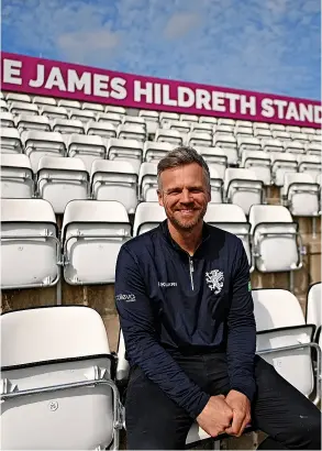  ?? ?? James Hildreth poses for a photo in the recently named The James Hildreth Stand during Day One of the LV= Insurance County Championsh­ip match between Somerset and Northampto­nshire