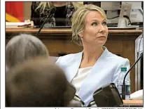  ?? Arkansas Democrat-Gazette/STATON BREIDENTHA­L ?? State Supreme Court Justice Courtney Goodson listens during a hearing in Pulaski County Circuit Judge Chris Piazza’s courtroom, the first of two hearings Friday in her battle to stop attack ads.