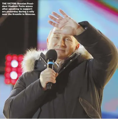  ?? AP PHOTO ?? THE VICTOR: Russian President Vladimir Putin waves after speaking to supporters yesterday during a rally near the Kremlin in Moscow.