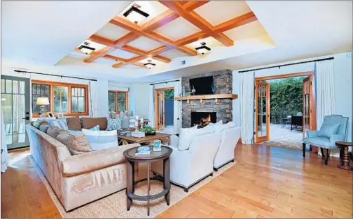  ?? James Moss Photograph­s by ?? FORMER DODGER pitcher Zack Greinke is selling his 2012 Craftsman, which has a theater, a gym, an office and five fireplaces.