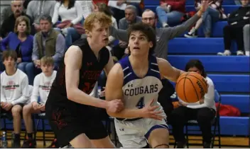  ?? NATHAN WRIGHT — LOVELAND REPORTER-HERALD ?? Resurrecti­on Christian’s Marcus Phillips drives to the basket against Steamboat Springs in the Class 4A Sweet 16playoff game Saturday at RCS.