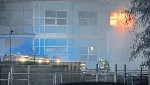  ?? Picture: George Mcluskie. ?? Emergency services tackling the fire at the biomolecul­ar sciences building on Sunday.