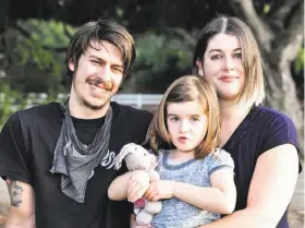  ?? Courtesy Tammy Grodt ?? Robert Grodt, a Mountain View native who died fighting in Syria, is seen with partner Kaylee Dedrick and their daughter, Tegan.