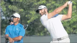  ?? CAROLYN KASTER — THE ASSOCIATED PRESS ?? Dustin Johnson enters the U.S. Open as the top-ranked player in the world and starts as the betting favorite at Shinnecock Hills, according to one Las Vegas oddsmaker.