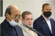  ??  ?? Warren E. Logan Jr., with the Urban League, front, speaks as Albert Waterhouse, center, and Allen Clare listen.