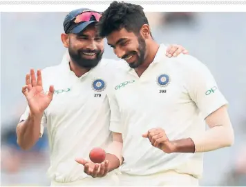  ?? GETTY IMAGES ?? Working in tandem: “When we bowl in a group, when we plan to set up the batsmen, he (Jasprit Bumrah) really enjoys that and that’s why he fits into the combinatio­n so well. He never felt that he was a newcomer and all that. His transition was very smooth,” Shami says about his teammate.