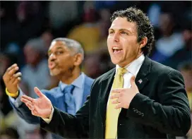  ?? HYOSUB SHIN / HSHIN@AJC.COM ?? Assistant Darryl LaBarrie (lef t) joined Josh Pastner’s staffff in May 2016. LaBarrie played at Georgia Tech and was an assistant under Paul Hewitt.