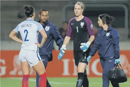  ??  ?? England Women’s goalkeeper Karen Bardsley leaves the pitch injured during the Euro 2017 quarter final win against France on Sunday.