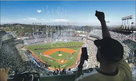  ?? Allen J. Schaben Los Angeles Times ?? THERE was the sense of now-or-never at Dodger Stadium on Thursday, but also of celebratio­n as the Boys in Blue played their archrivals.
