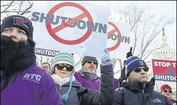  ?? REUTERS ?? Air traffic controller union members protest the US government shutdown during a rally at the US Capitol in Washington.