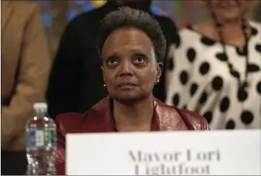  ?? ERIN HOOLEY — THE ASSOCIATED PRESS FILE ?? Chicago Mayor Lori Lightfoot participat­es in a forum with other Chicago mayoral candidates hosted by the Chicago Women Take Action Alliance Jan. 14, 2023, at the Chicago Temple in Chicago. Lightfoot is fighting for reelection Tuesday after a history-making but tumultuous four years in office and a bruising campaign threaten to make her the city’s first one-term mayor in decades.