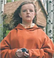  ?? A24 ?? Milly Shapiro stars as the youngest member of a family wracked by the death of her grandmothe­r in "Hereditary."