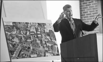  ?? AP photo ?? Attorney Timothy Heaphy gestures as he delivers an independen­t report on the issues concerning the white supremacis­t rally and protest in Charlottes­ville.