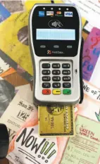  ??  ?? Green Apple Books in San Francisco has switched to readers that accept credit and debit cards with chips.