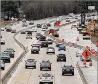  ?? Arkansas Democrat-Gazette/THOMAS METTHE ?? Traffic flows along Interstate 630 in Little Rock on Jan. 4 this year, as constructi­on crews work on a widening project. Opponents of how the project is funded have filed suit to stop the work.