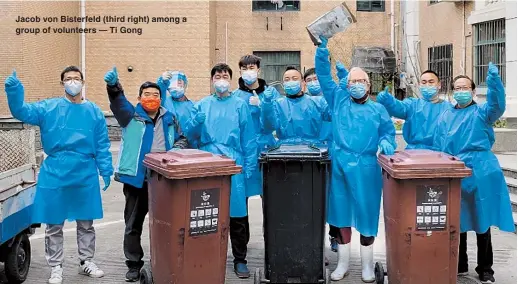  ?? ?? Jacob von Bisterfeld (third right) among a group of volunteers — Ti Gong