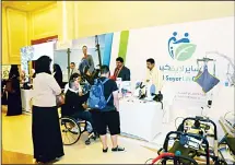  ??  ?? Visitors at Al-Sayer Medical booth.