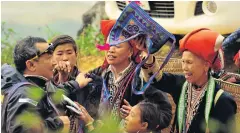  ??  ?? ABOVESapa in northweste­rn Vietnam, home to the Hmong, Tay and Dao hill tribes, is a populardes­tination with trekkers.