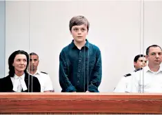  ??  ?? In the dock: is it right to treat 12-year-old Ray (Billy Barratt) like an adult murderer?