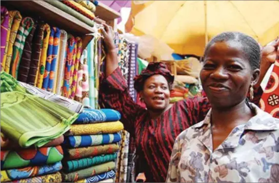  ??  ?? A textile market in Lagos