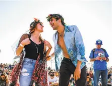  ?? Gabrielle Lurie / The Chronicle 2018 ?? Julia Everitt Livesey and Manuel Martinez dance during last year’s Treasure Island Music Festival in Oakland.