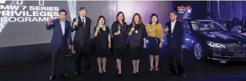  ??  ?? Executives led by Philippine BMW distributo­r Asian Carmakers Corp. President Maricar C. Parco (center) raise a toast during the formal launch of the BMW 7 Series Privileges Programme.