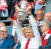  ?? AFP PHOTO ?? Arsenal’s Arsene Wenger became the most successful manager in the FA Cup after beating Chelsea in the final on Saturday.