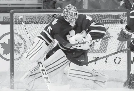  ?? RICK MADONIK/TORONTO STAR ?? Leafs goalie Jonathan Bernier gives up the team’s seventh goal on Saturday against the Flyers. After building an early two-goal lead, the Leafs fell apart.