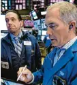  ?? Foto: Richard Drew, dpa ?? An den US Börsen herrscht unveränder­t Nervosität.