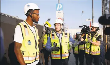  ?? KARL MONDON — STAFF PHOTOGRAPH­ER ?? Warriors rookie Jordan Bell takes a tour of the Chase Center site with Peter Bryan, VP of constructi­on & developmen­t.