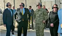  ?? AFP ?? Pompeo and his wife Susan wait to board a helicopter to the US embassy at the terminal at Baghdad Internatio­nal Airport. —