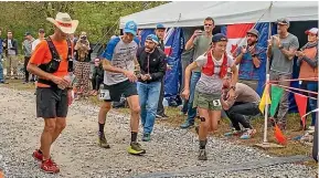  ??  ?? Will Hayward, second from left, finished second in the Big’s Backyard Ultra race in Tennessee.
Right: Katie Wright also competed in the
ultra race and was ‘‘gutted’’ that she had to pull out after 50 hours.