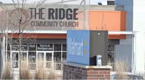  ?? PAT A. ROBINSON / MILWAUKEE JOURNAL SENTINEL ?? The Ridge Community Church bought the former Walmart building at 4500 S. 108th St., Greenfield. The church uses part of the building and leases part to the St. Vincent de Paul Society for a thrift store. Lease restrictio­ns on the building barred uses...