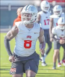  ?? Las Vegas Review-journal @Left_eye_images ?? L.E. Baskow
UNLV senior running back Charles Williams warms up during the first spring football practice at Rebel Park on Tuesday.