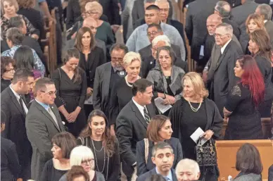  ??  ?? Family and friends attend Friday’s funeral for former Rep. Ed Pastor at St. Francis Xavier Catholic Church in Phoenix.