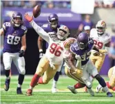  ?? GETTY IMAGES ?? Minnesota’s Dalvin Cook fumbles the ball in a game against the San Francisco 49ers.