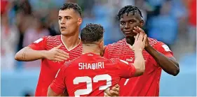  ?? Picture: Dan Mullan/Getty ?? Breel Embolo, right, is congratula­ted on his goal