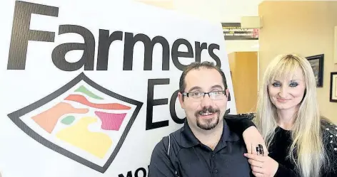  ??  ?? Farmers’ Edge CEO Wade Barnes, left, and Farmers’ Edge director of marketing Marina Barnes in the company’s Winnipeg office in 2013.