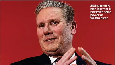  ?? ?? Sitting pretty: Keir Starmer is poised to seize power at Westminste­r