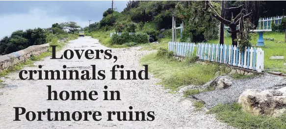  ?? RUDOLPH BROWN/PHOTOGRAPH­ER ?? The path along which lovers travel for secret rendezvous off Port Henderson Road in Portmore, St Catherine.