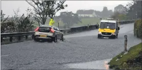  ?? Photograph: Abrightsid­e Photograph­y ?? Last week’s torrential downpours saw drivers using the A82 at Onich having to negotiate flooding such as this on October 8.