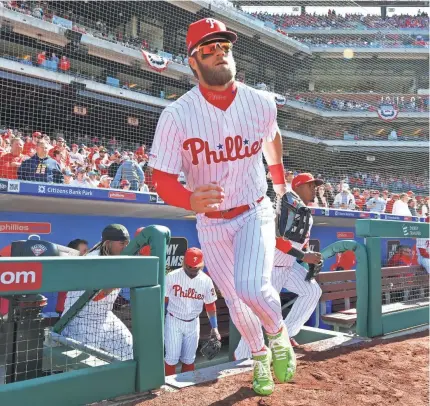  ?? DREW HALLOWELL/GETTY IMAGES ?? Bryce Harper received several standing ovations Thursday from the Phillies crowd at Citizens Bank Park. He went 0-for-3.