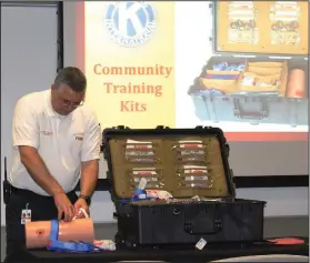  ??  ?? Mosby: El Dorado Fire Chief Chad Mosby demonstrat­es “wound packing” during a Stop the Bleed training session.