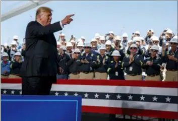  ?? EVAN VUCCI — THE ASSOCIATED PRESS ?? President Donald Trump arrives to speak on energy infrastruc­ture at the Cameron LNG export facility, Tuesday in Hackberry, La.