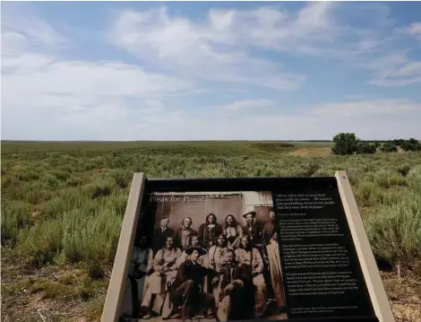  ?? Allen J. Schaben photos / Los Angeles Times/TNS ?? A sign marks the Sand Creek Massacre National Historic Site near Eads, Colo. The massacre took place over 30 square miles.