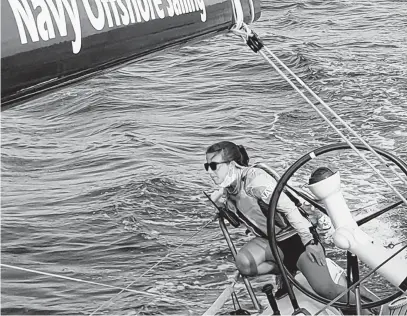  ?? COURTESY PHOTO ?? Katie Boyle, skipper of the Naval Academy offshore sailing teamWahoo, led her team to victory at the Race to the Lighthouse­s.