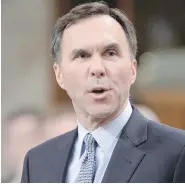  ?? ADRIAN WYLD / THE CANADIAN PRESS ?? Finance Minister Bill Morneau speaks during question period on Wednesday. The incoming Liberals performed
the “Cupboard is Bare” routine, writes Andrew Coyne.