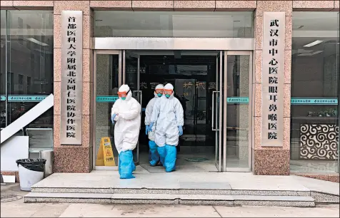  ?? CHRIS BUCKLEY/THE NEW YORK TIMES ?? Wuhan City Central Hospital is the epicenter of the coronaviru­s. An American died from the virus in Wuhan.